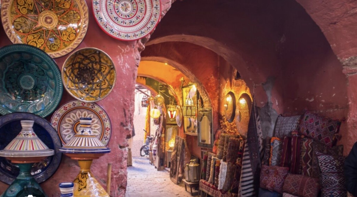 Colourful plates and lanterns in a Marrakech souk