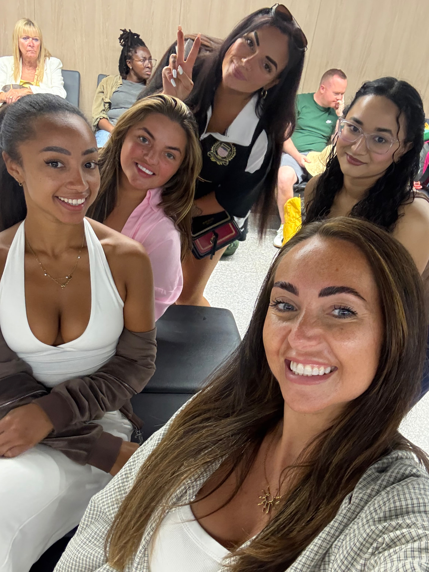 A group selfie of She Goes Solo girls waiting to travel